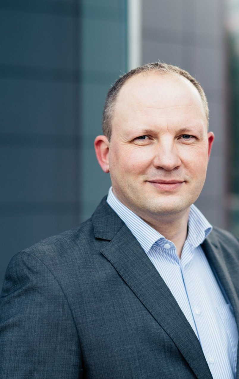 Porträtfoto von Dr. Karsten Zimmermann, Leiter Monitoring und Data Engineering bei DMT