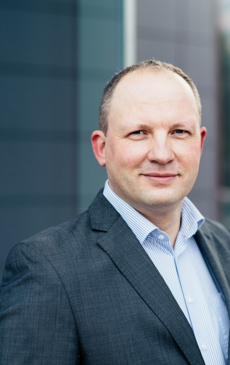 Porträtfoto von Dr. Karsten Zimmermann, Leiter Monitoring und Data Engineering bei DMT