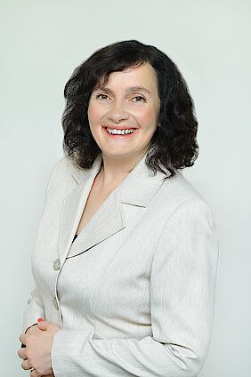 A portrait photo of a female businesswoman
