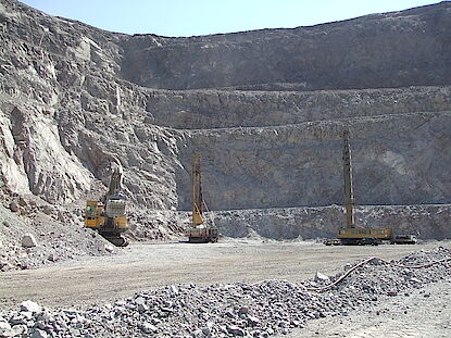 Blasthole drilling in an iron ore open pit mine